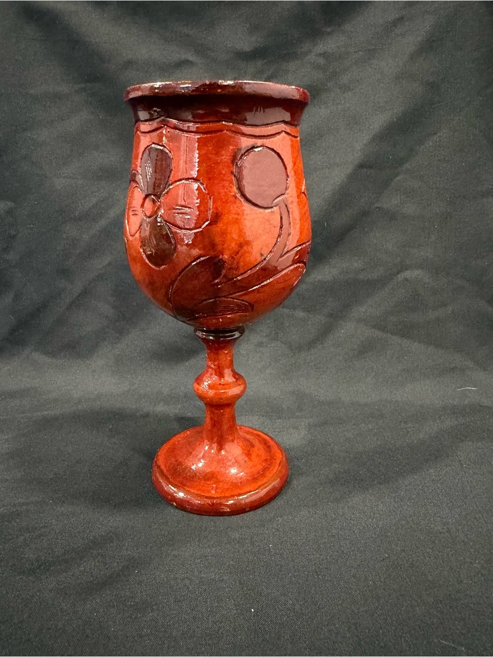 Vintage hand-carved Haitian wooden goblet, floral designs and glossy finish.